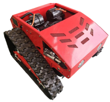 Red tracked remote-controlled brush cutter from an elevated angle, showing the engine compartment and tracks.
