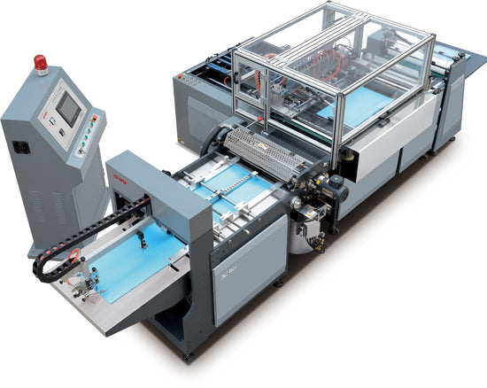 JDS750 automatic interior lining machine with control panel and blue sheets on conveyor